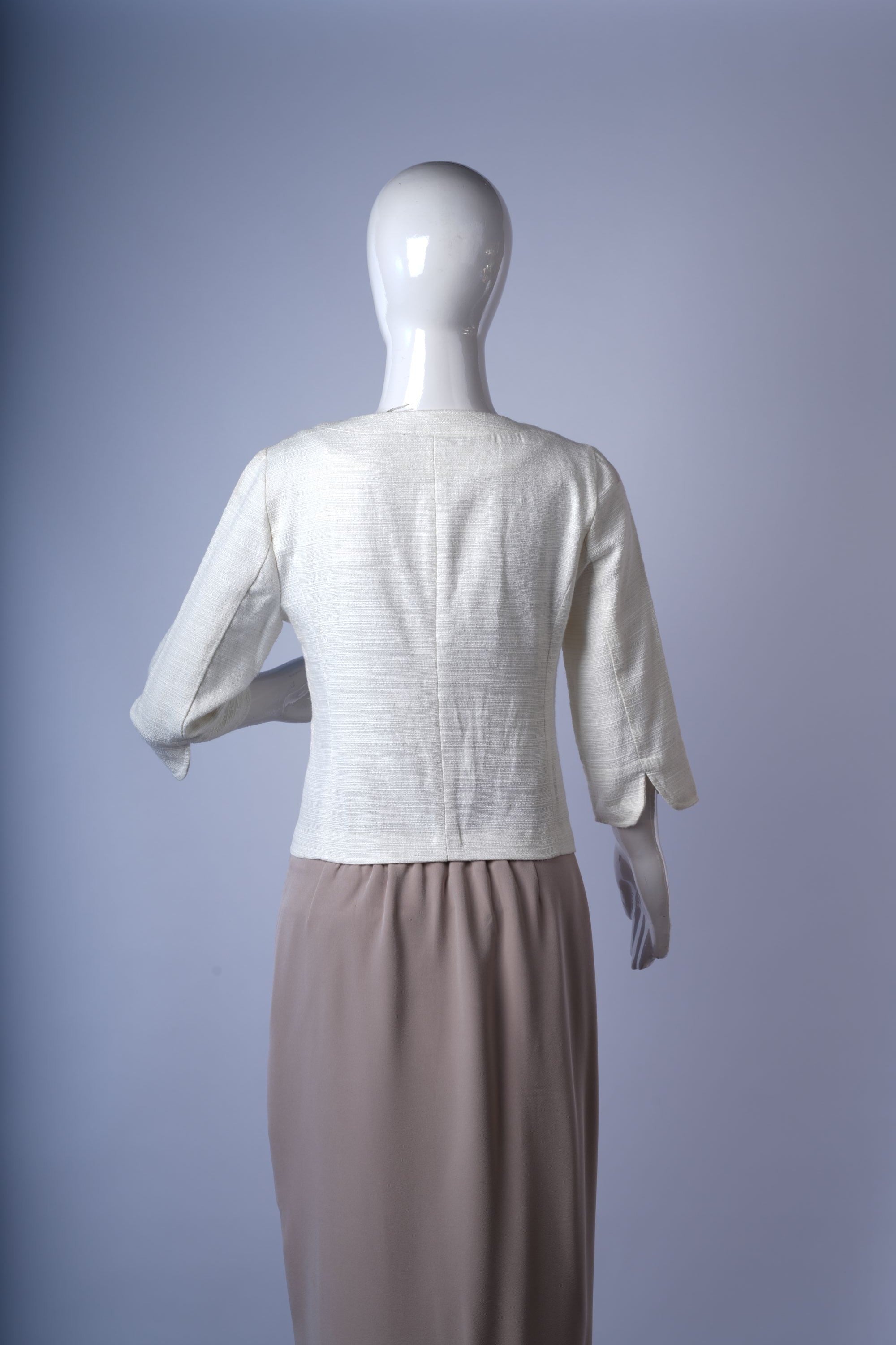 White tweed jacket perfect for formal or dressy casual styling.