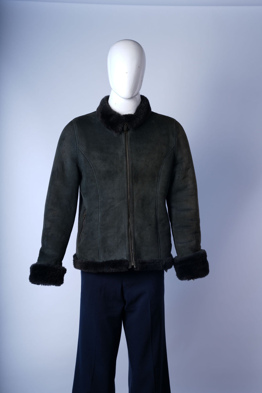 women's aviator-style suede jacket featuring front zipper, ribbed cuffs, and side pockets.