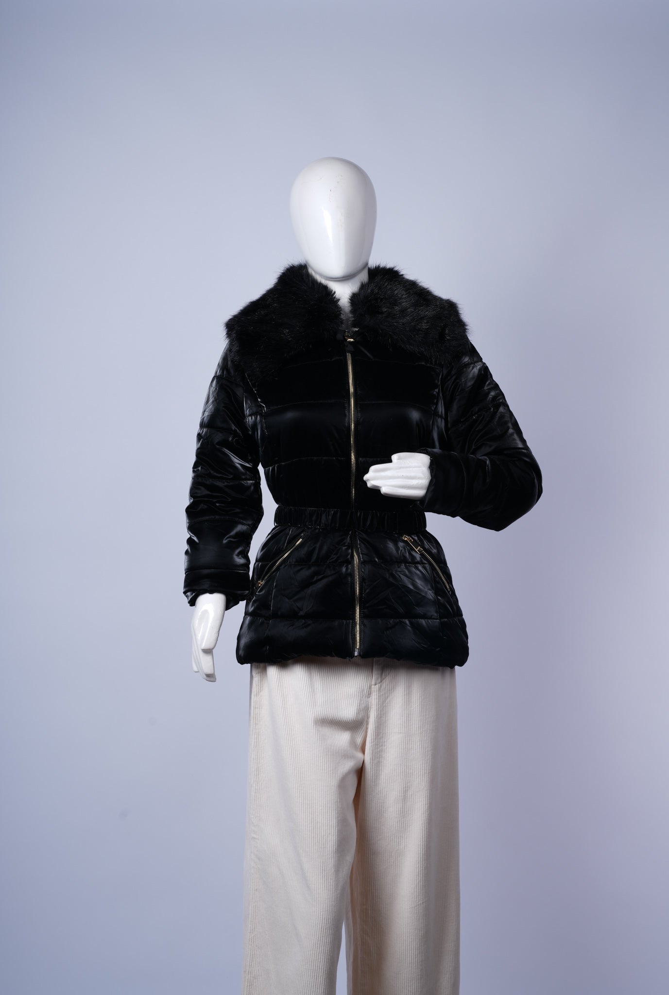 women's stylish black puffer jacket ideal for warm winter layering.