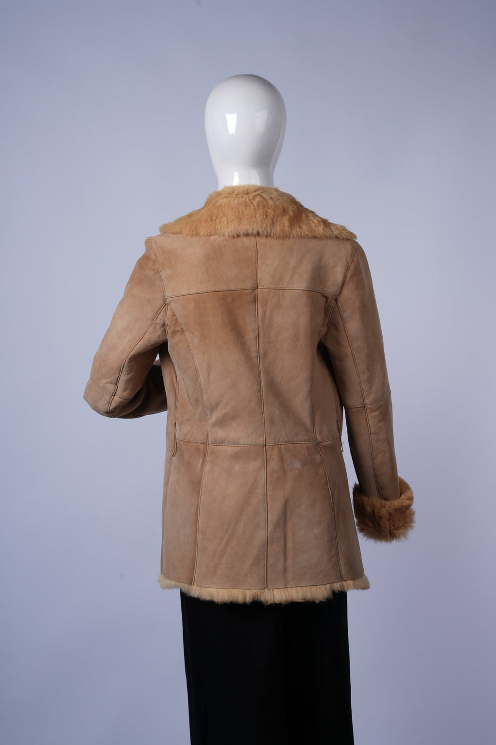 Rugged and chic suede jacket perfect for cold-weather layering.