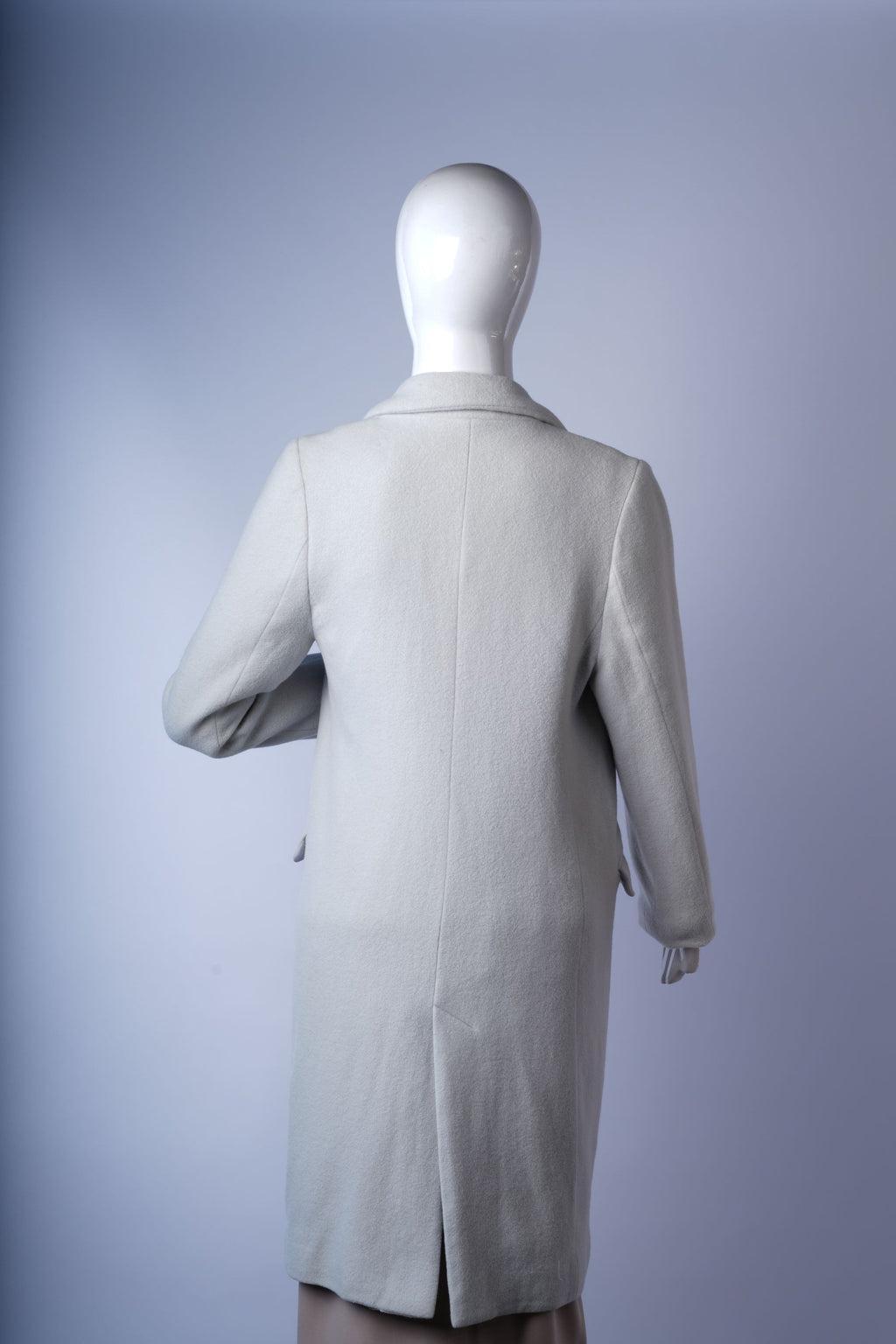 Stylish notched-lapel gray coat perfect for polished everyday or office wear.