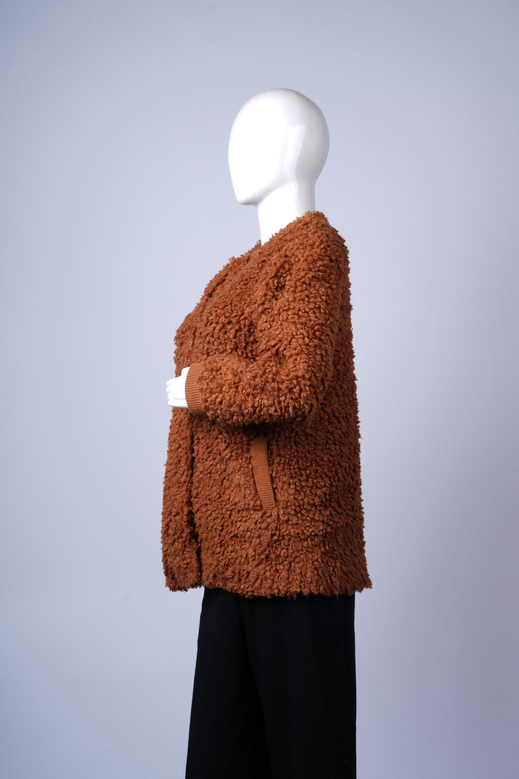 Chic open-front winter coat featuring soft, cozy plush fabric.