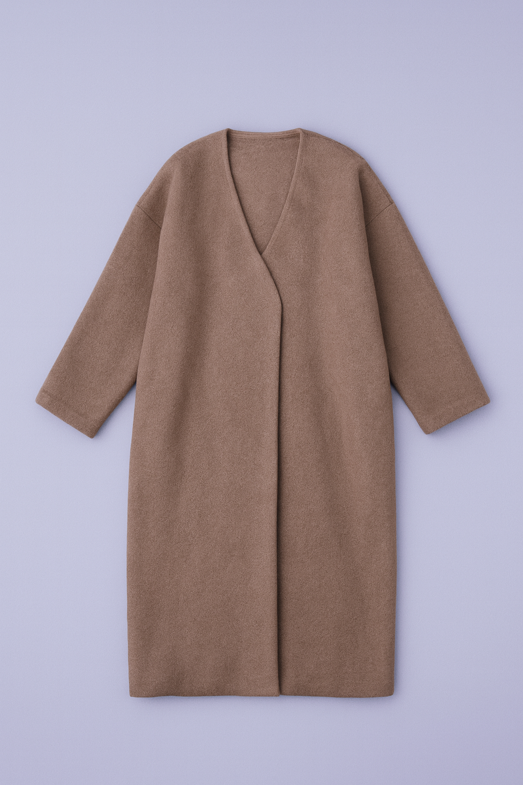 women's neutral collarless wool coat with gold buttons, slit pockets, and satin lining.