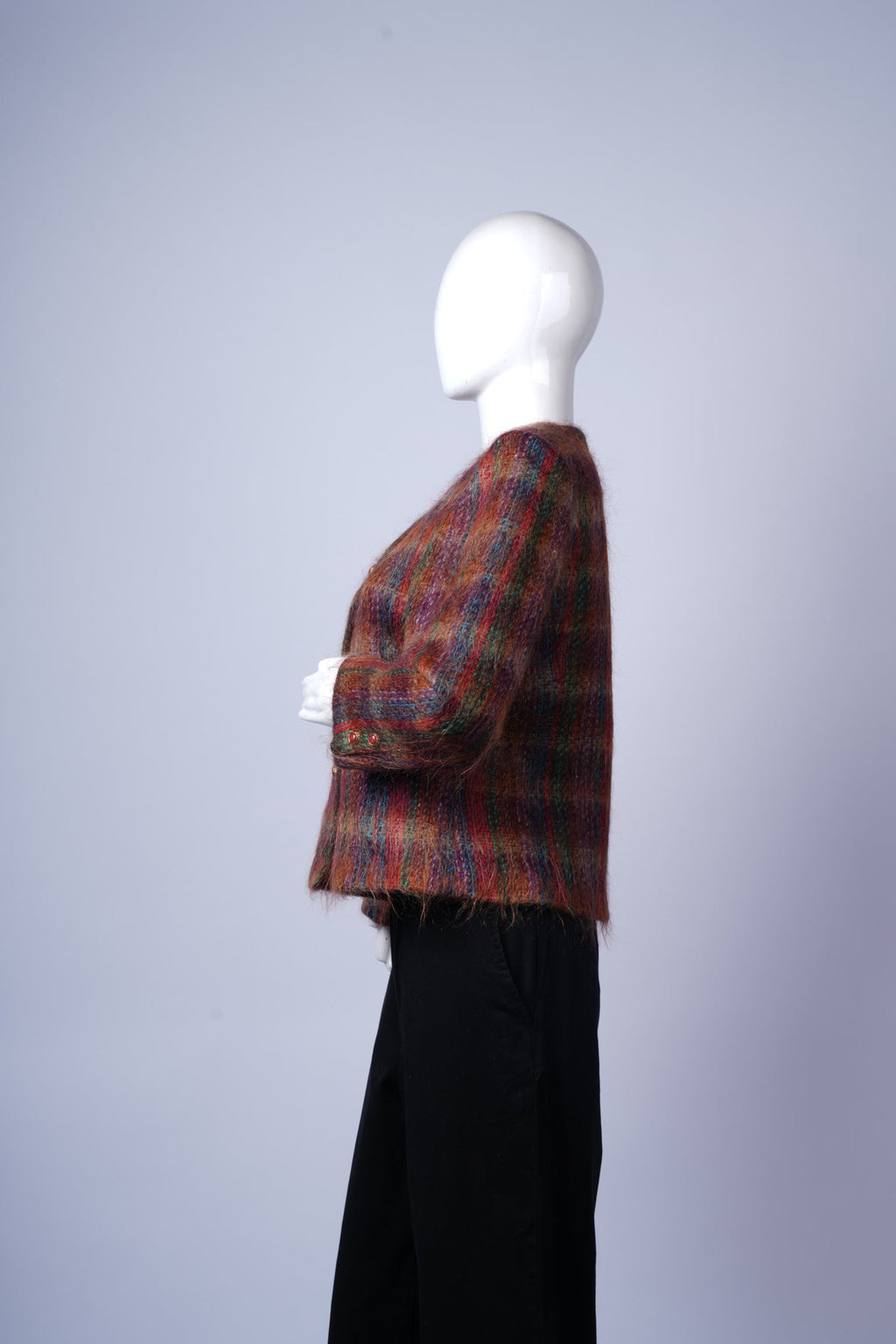 Stylish wool-blend coat featuring bright plaid pattern and classic tailored design.