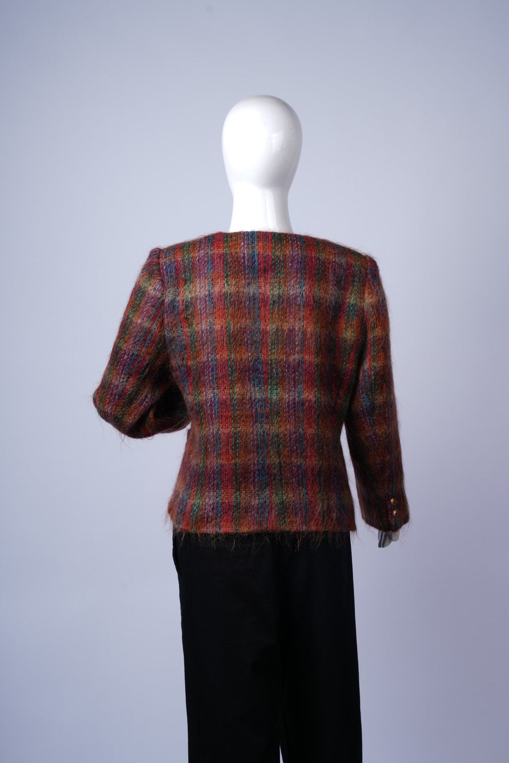 Elegant plaid coat perfect for layering over everyday or semi-formal outfits.