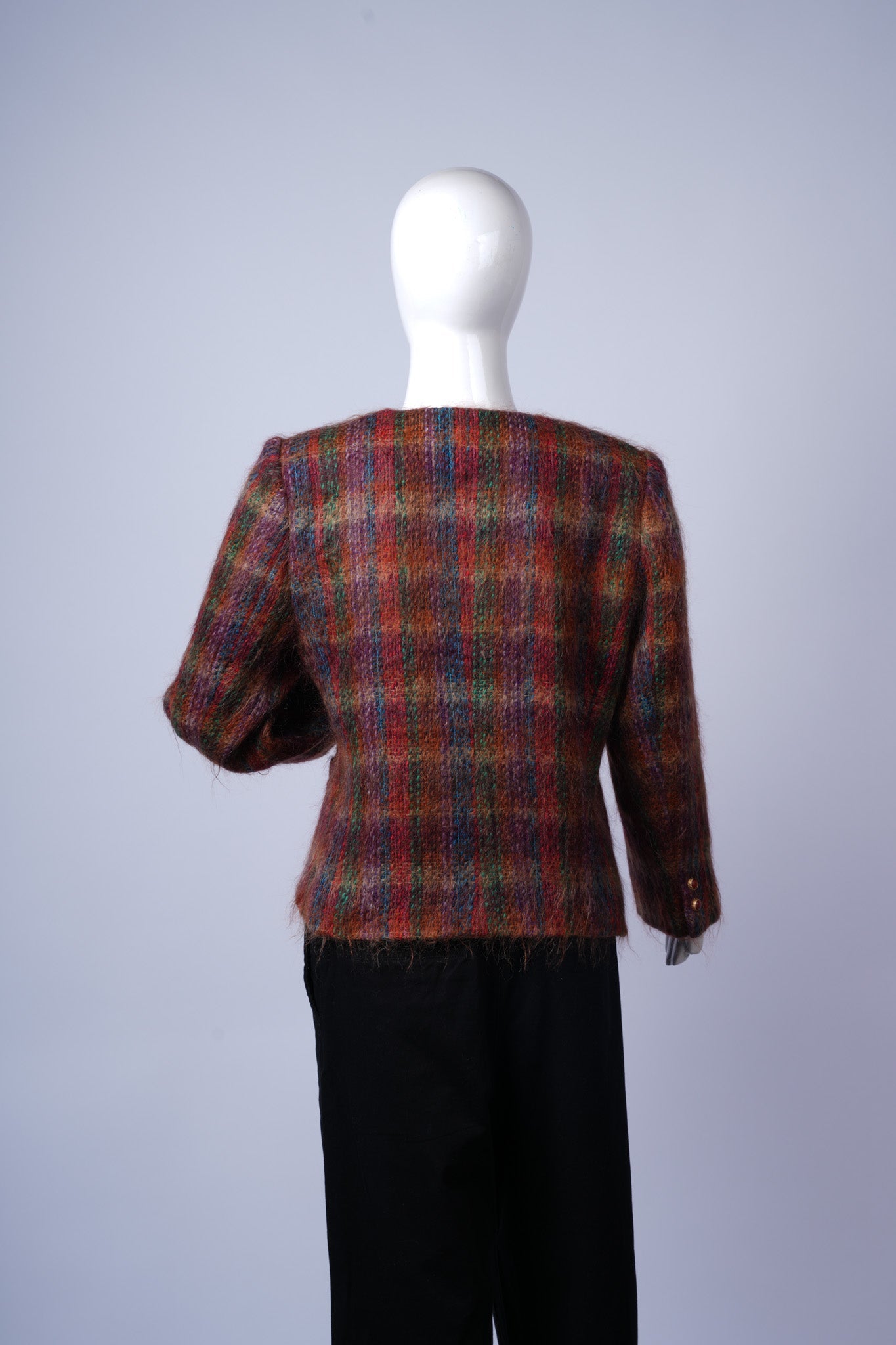 Elegant plaid coat perfect for layering over everyday or semi-formal outfits.
