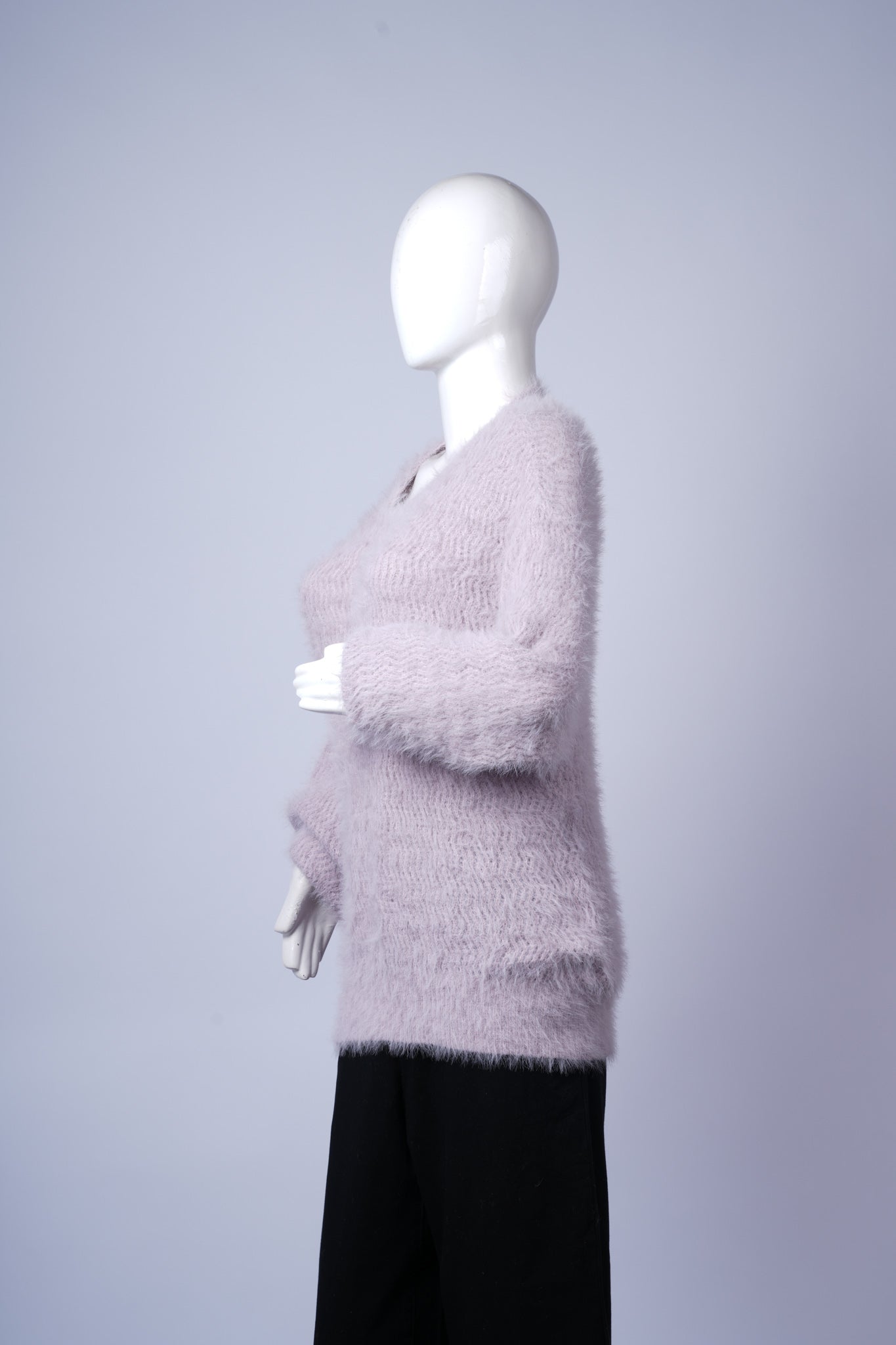 Relaxed-fit knit sweater in light purple, perfect for casual styling.