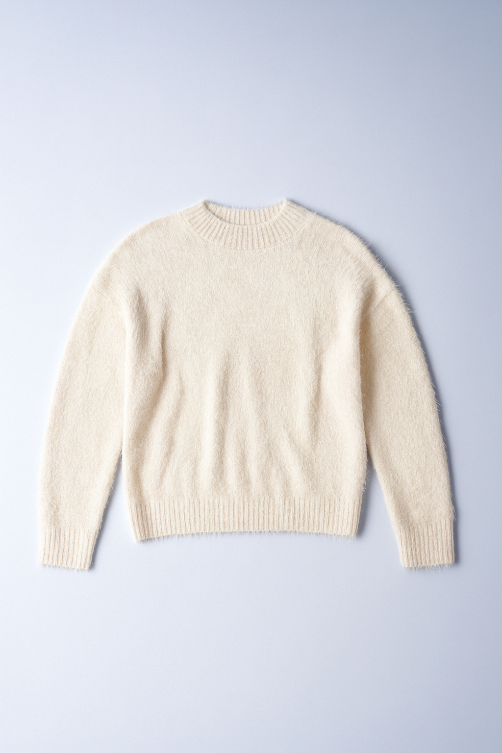 women's fluffy white faux fur sweater, soft and cozy for everyday wear.