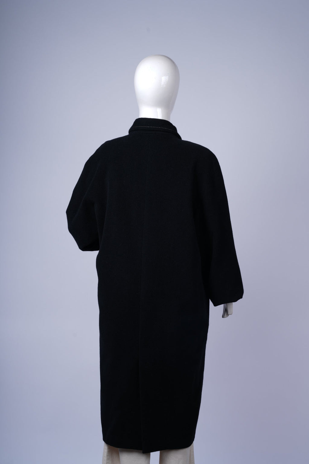 Sophisticated wool-blend coat perfect for office or evening wear.