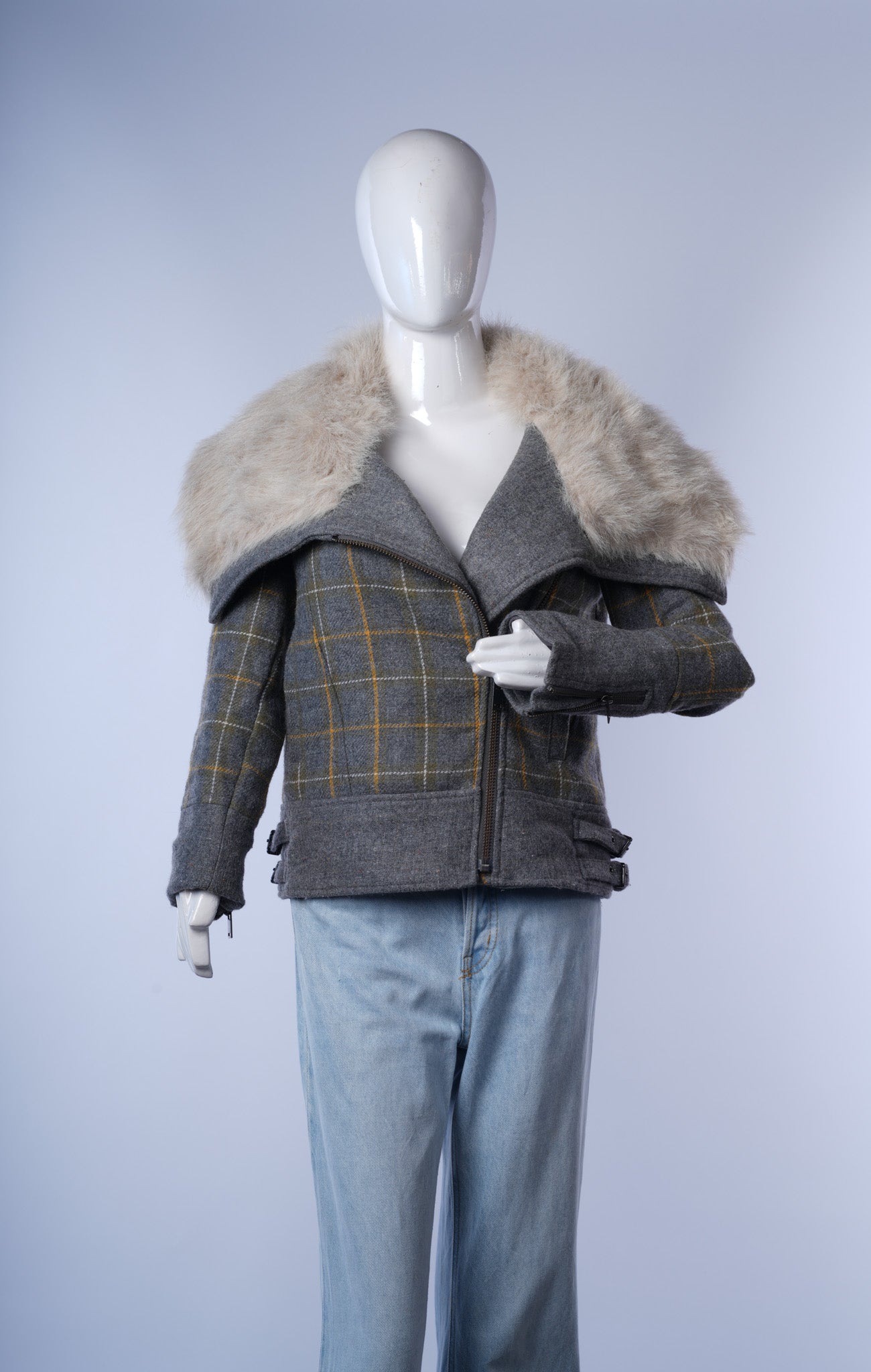 women's checkered wool jacket featuring off-white fur trim and edgy moto design.