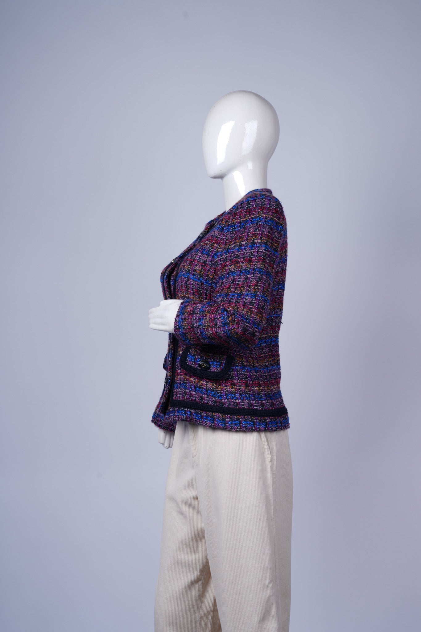 Classic multicolor coat featuring tailored fit and chic trim details.