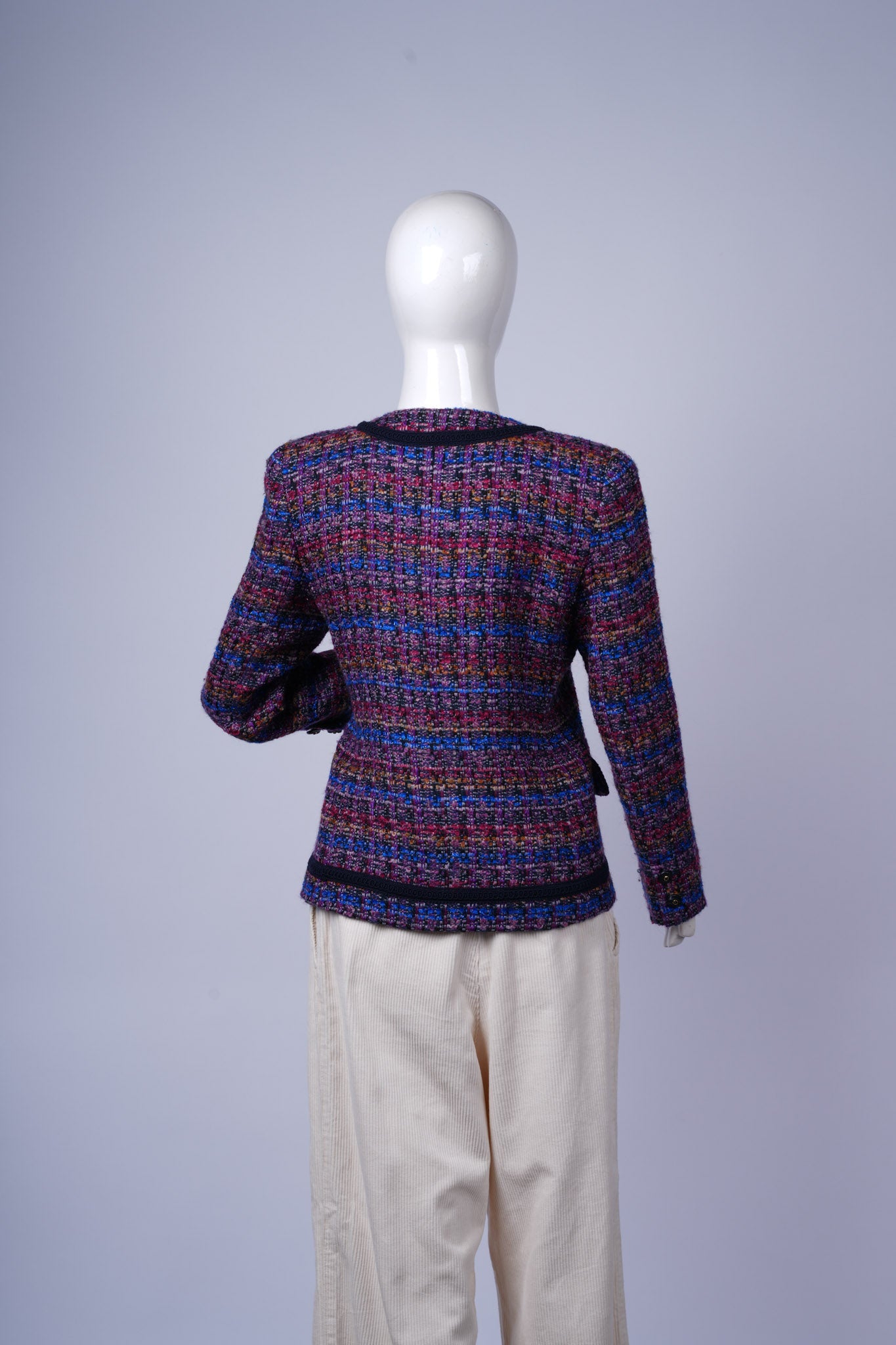 Stylish tweed outerwear perfect for formal or smart-casual winter styling.