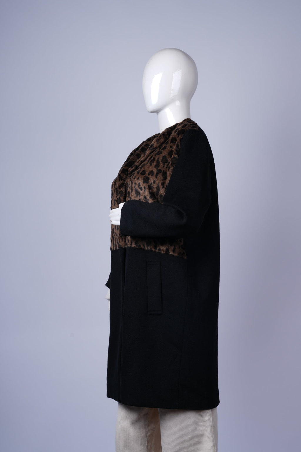 Statement winter coat with tailored fit and eye-catching two-tone design.