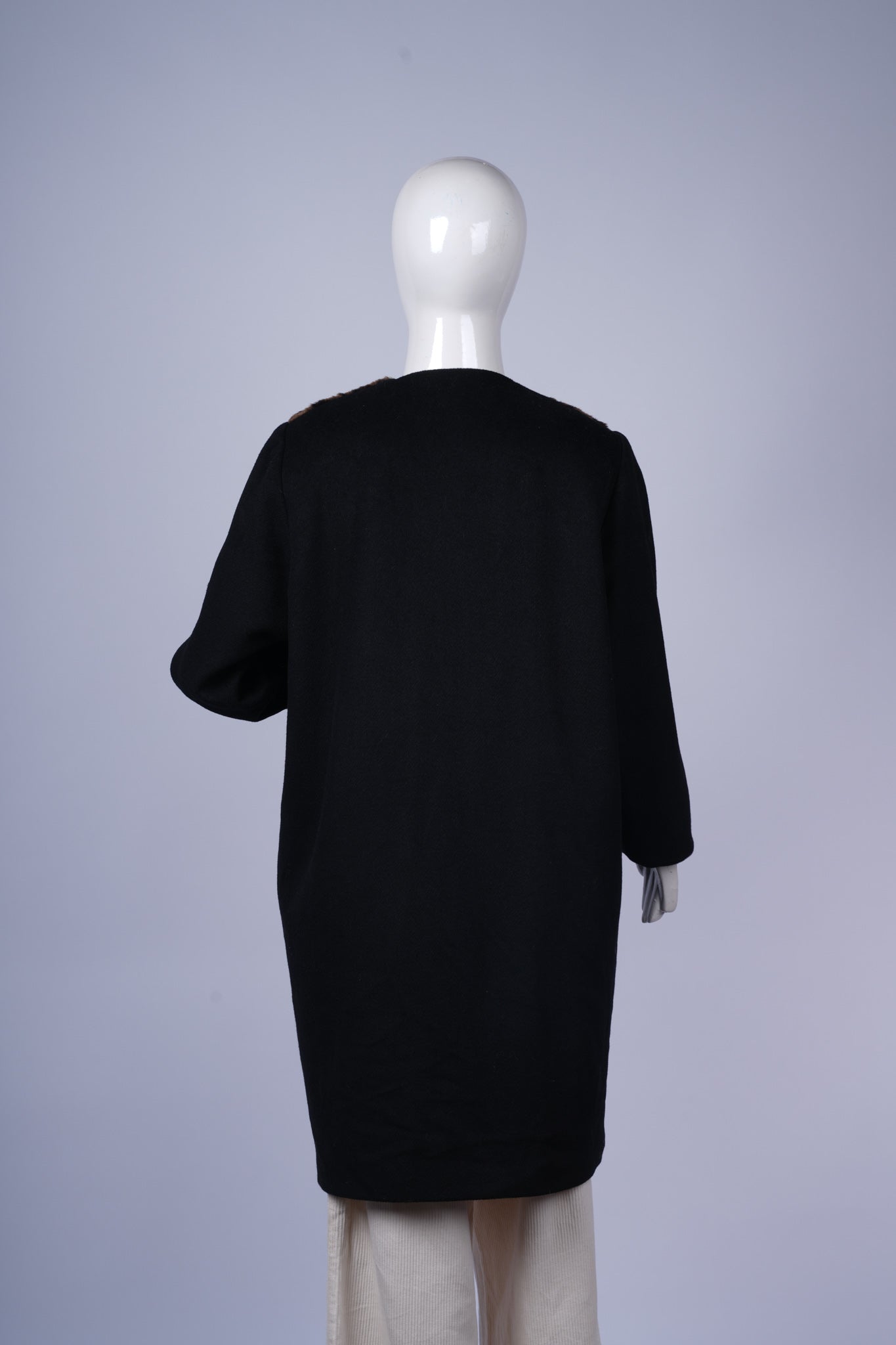 Stylish leopard-print coat perfect for standout cold-weather layering.