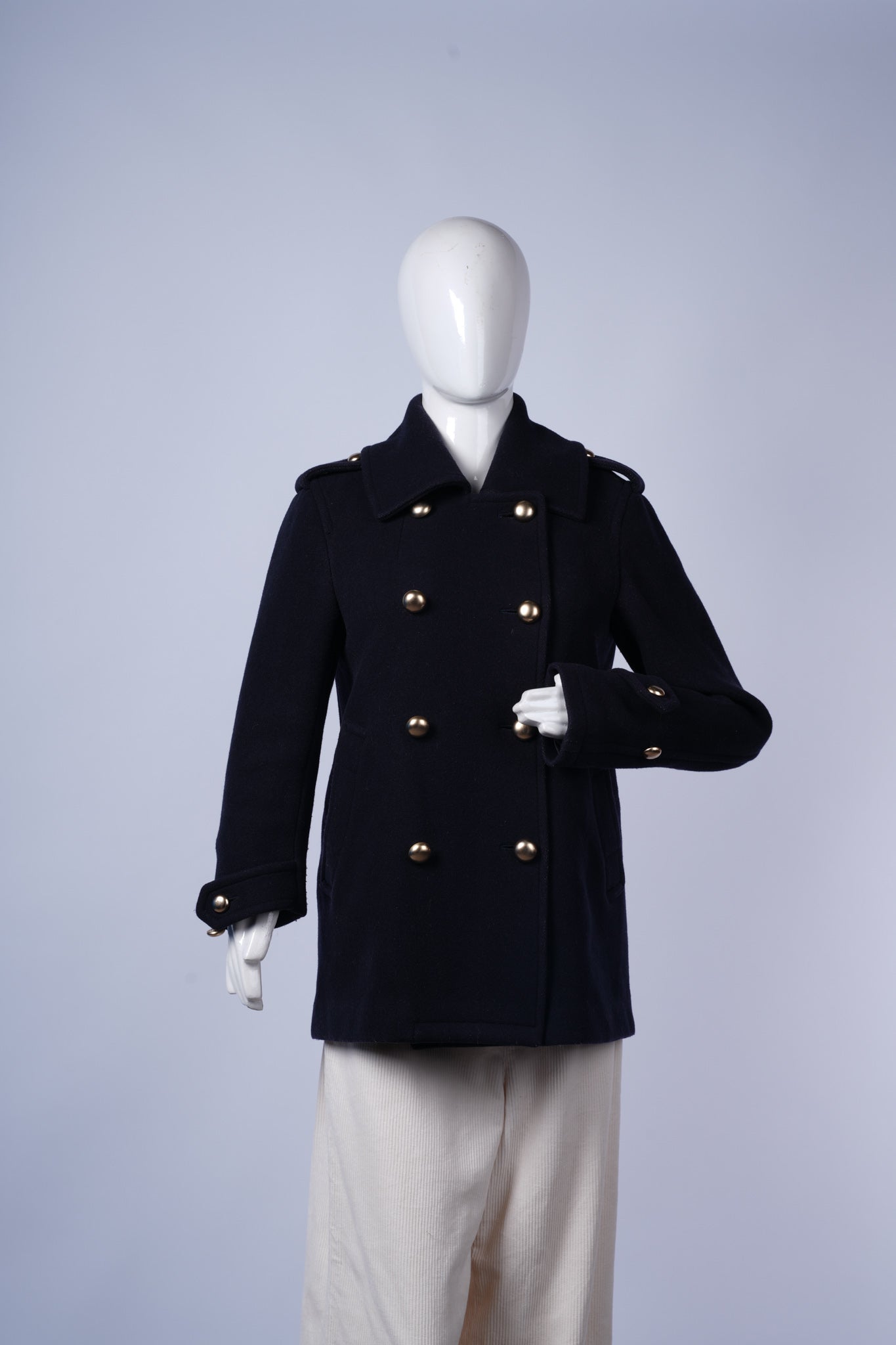 women's wool-blend coat combining polished tailoring with casual winter style.