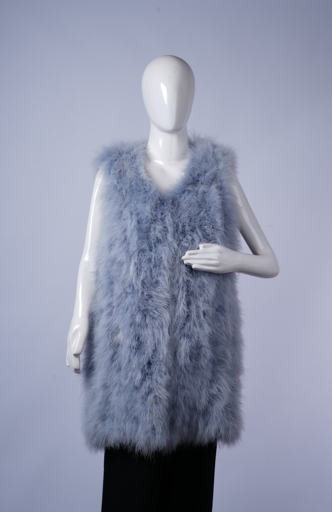 women's chic vest adding glamour and warmth to casual or dressy outfits.