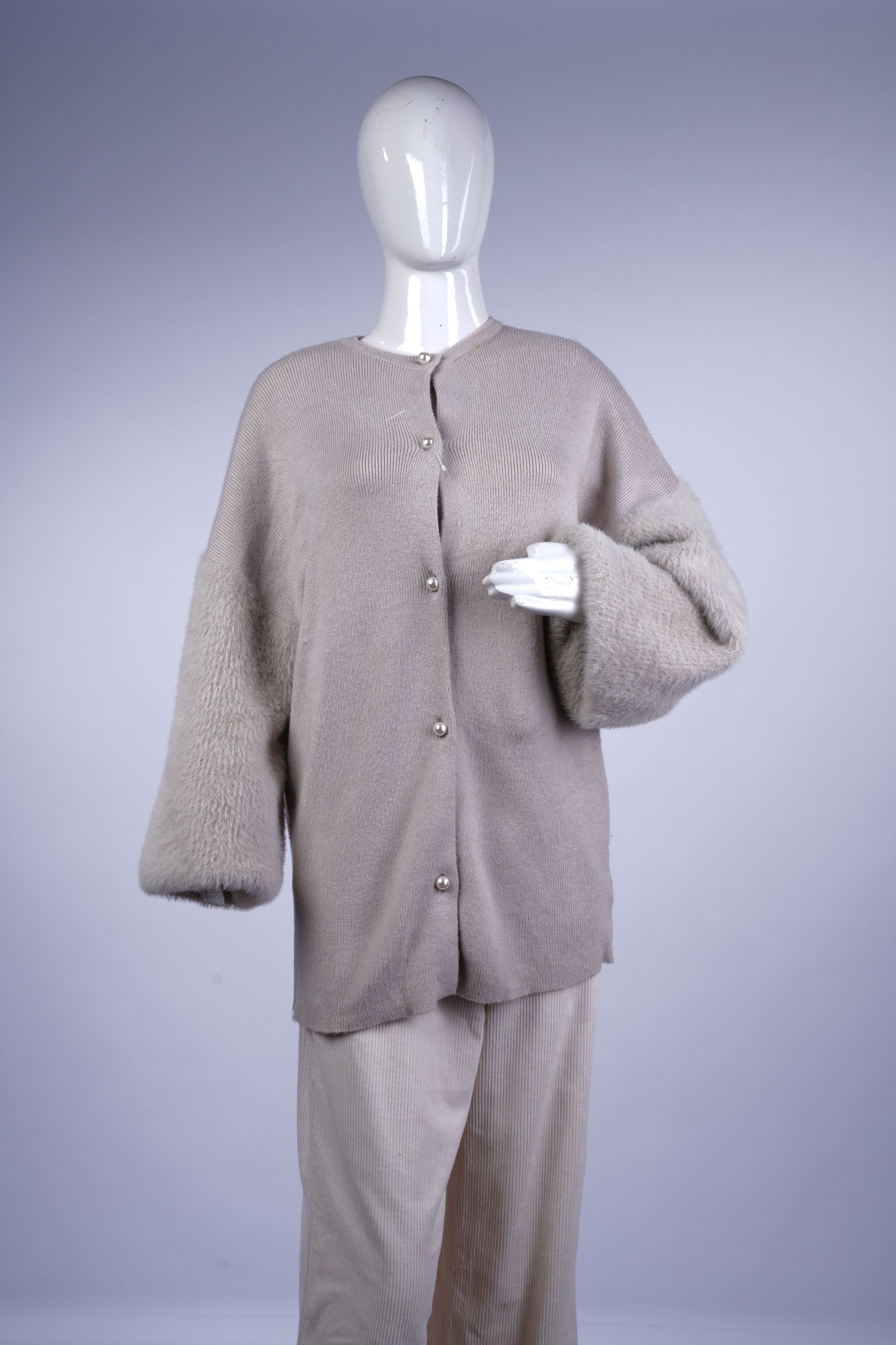 women's cozy winter sweater featuring soft texture and feminine design details.