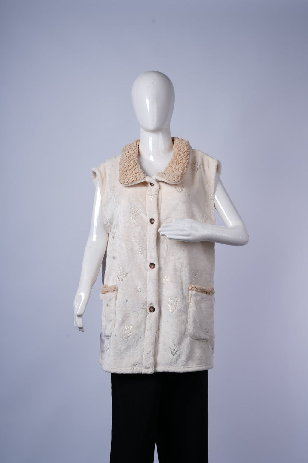 women's warm sleeveless vest ideal for layering over tops or sweaters.