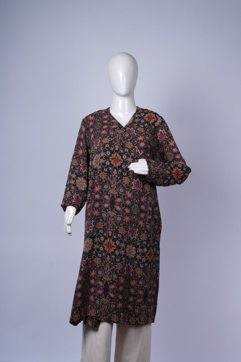 women's flowing kaftan with detailed print suitable for casual or semi-formal wear.