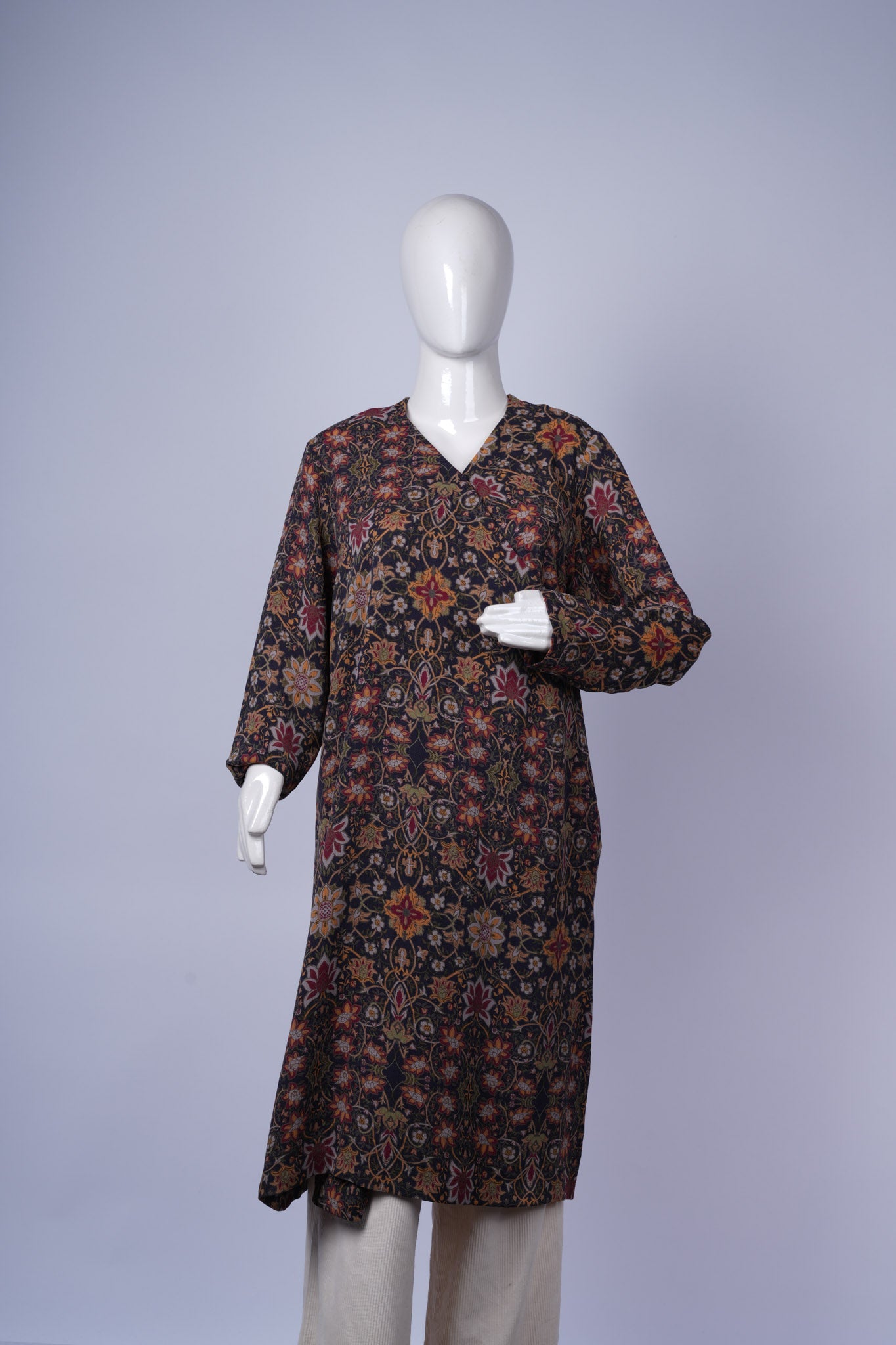 women's flowing kaftan with detailed print suitable for casual or semi-formal wear.