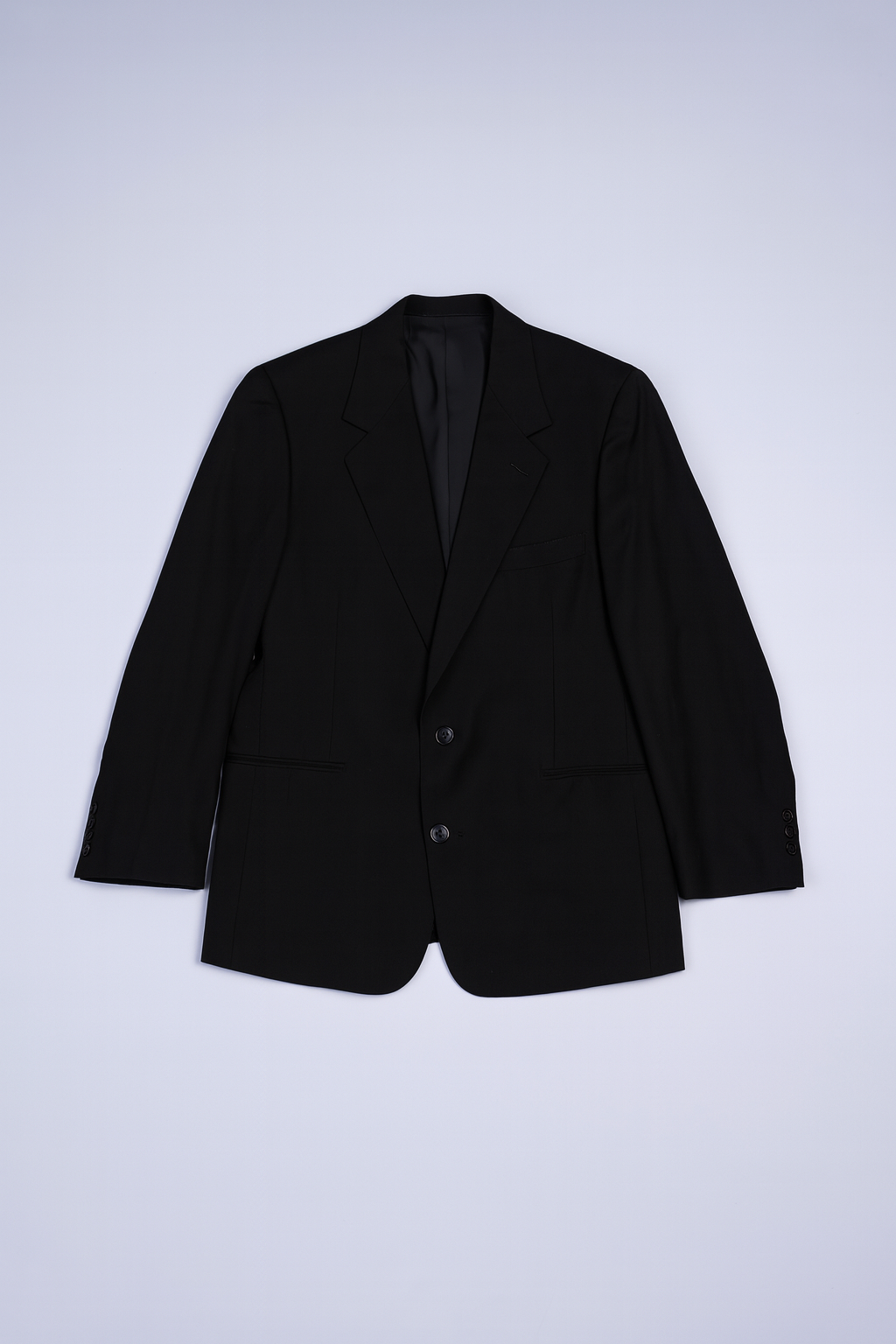 Men?s black single-breasted blazer with notched lapels and flap pockets.
