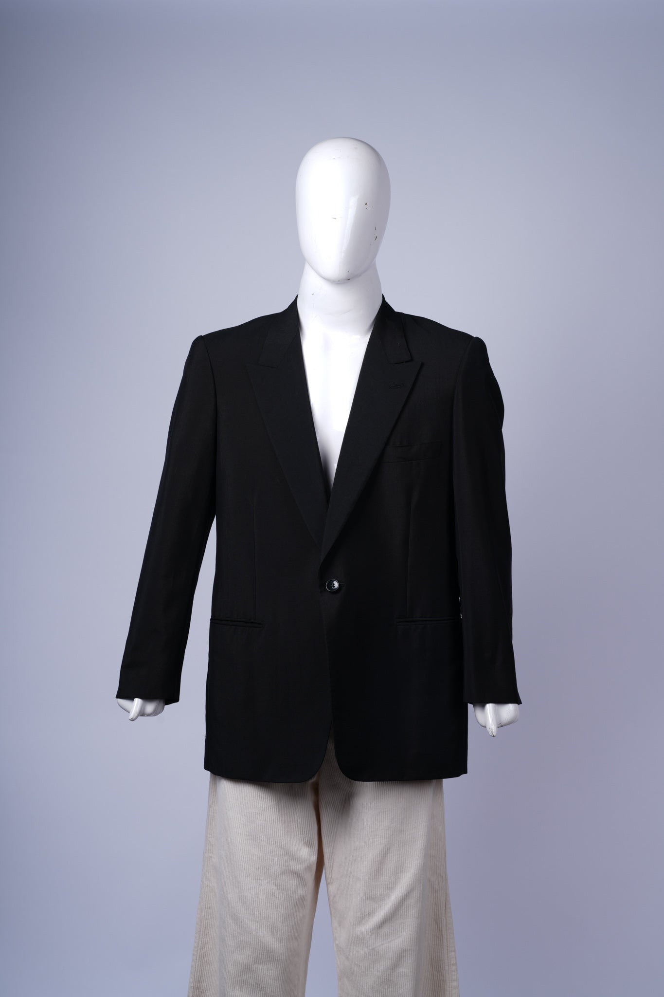 Elegant black blazer for men, ideal for formal or smart-casual occasions.