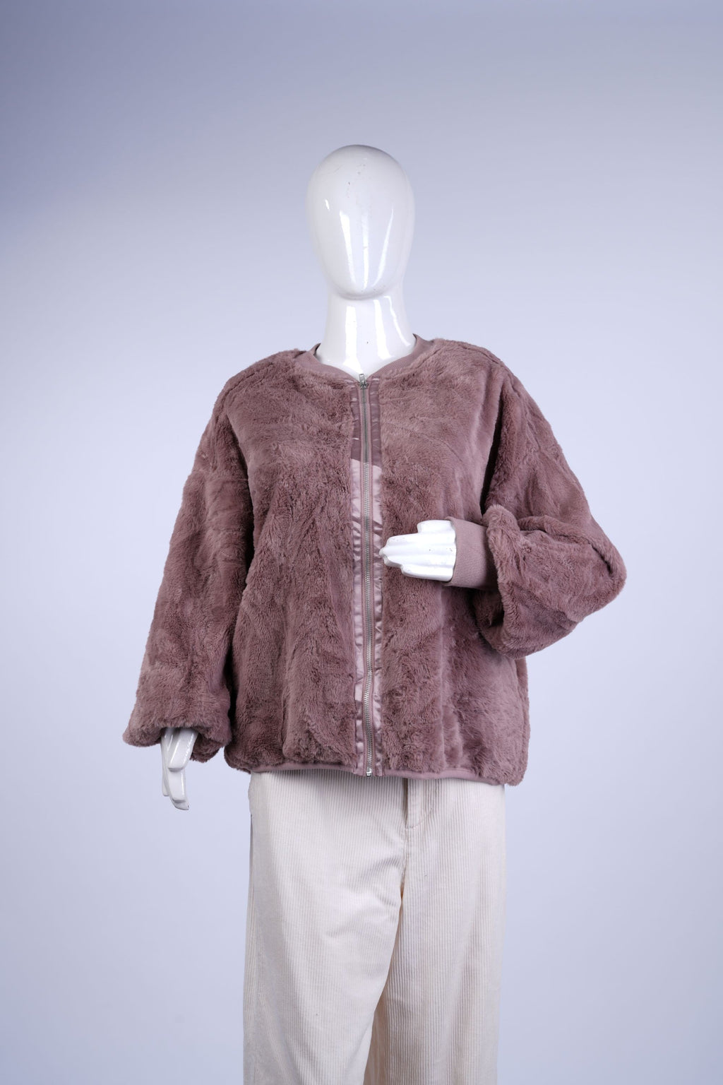 women's cozy zip-up jacket featuring ribbed cuffs and hem for casual styling.