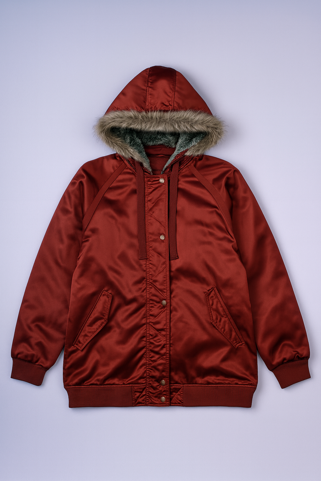 women's rust quilted winter jacket with hood, full zipper, and rib-knit cuffs.