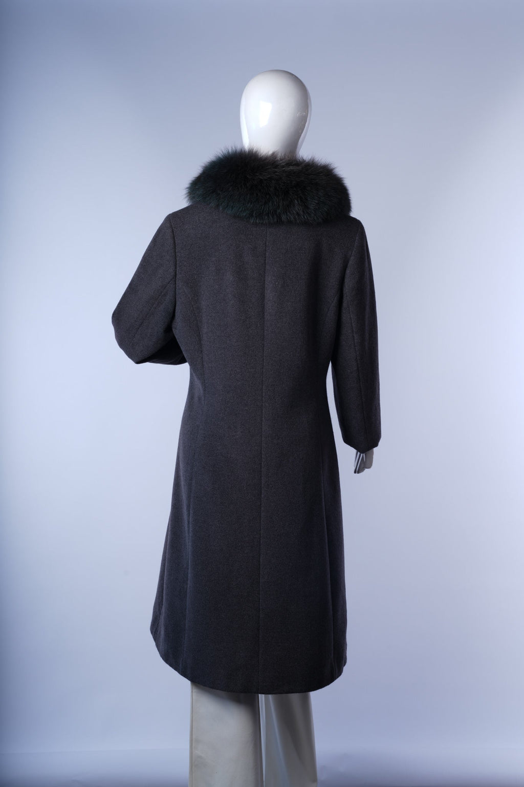 Side view of warm wool Chester overcoat in neutral tone