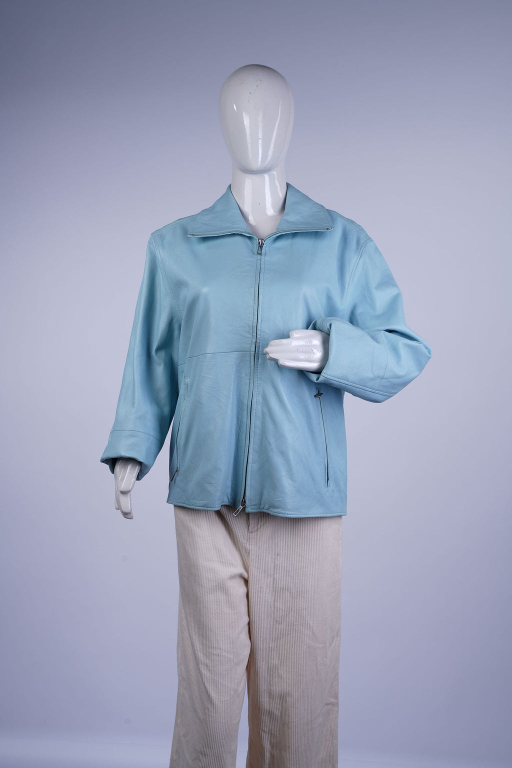 Cozy women's winter coat featuring quilted design and adjustable belt.