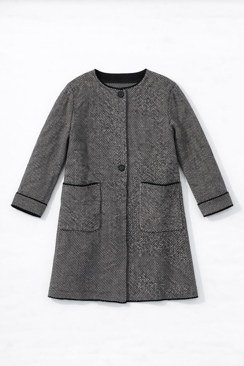 Mid-length tweed coat with hidden snap closure, long sleeves, and slit pockets