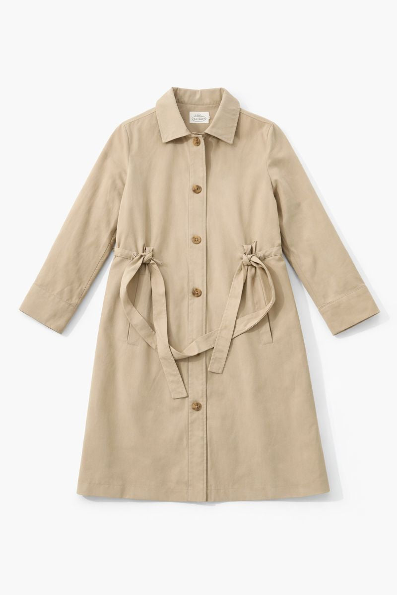 Light beige oversized cotton-linen overcoat with flared silhouette and wide sleeves