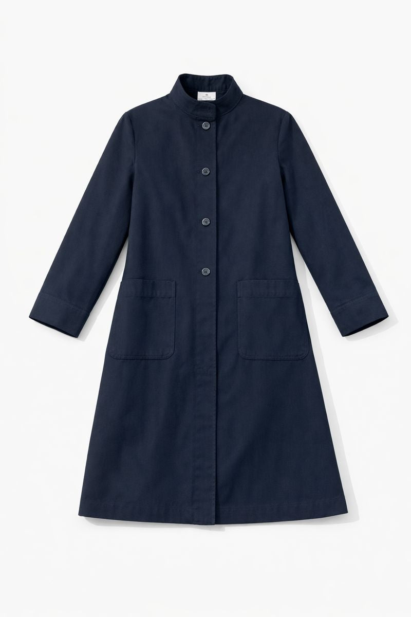 Knee-length single-breasted coat with stand-up collar, long sleeves, and front patch pockets