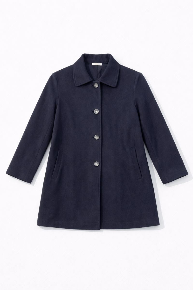 Tailored short coat with classic collar, button-front closure, and welt pockets