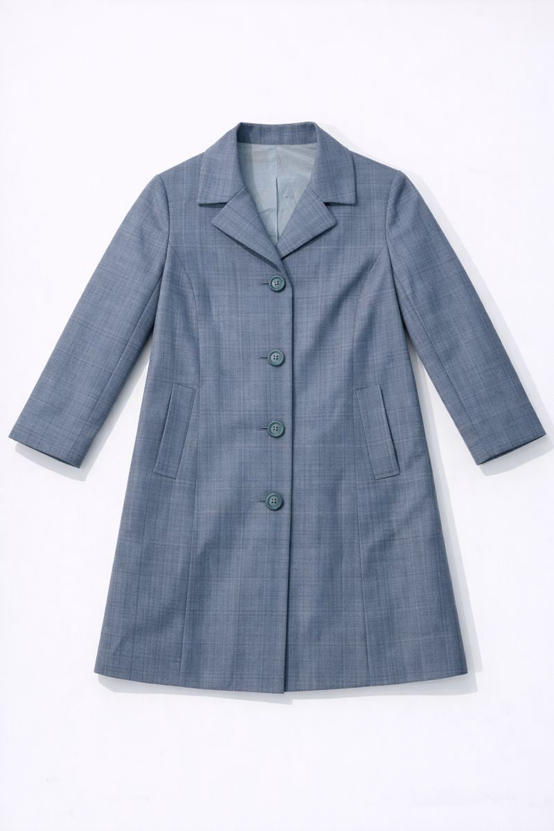 Single-breasted coat with notched collar, six-button front, and vertical slit pockets