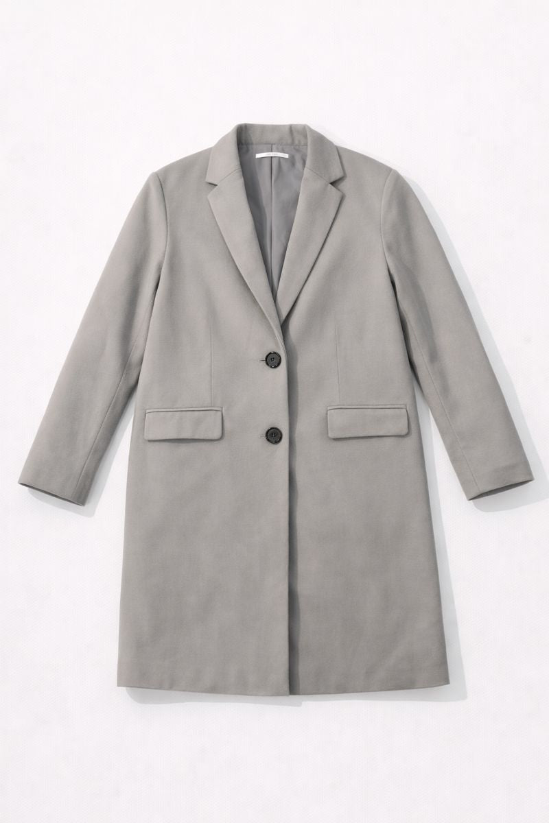 Women? longline tailored Chester coat with notch lapels and flap pockets