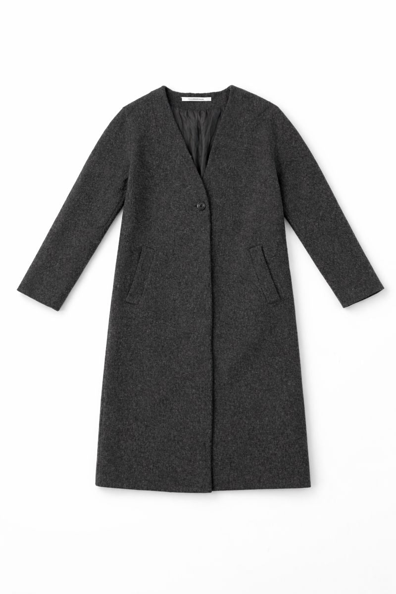 Minimalist collarless mid-length coat with front patch pockets and V-neckline