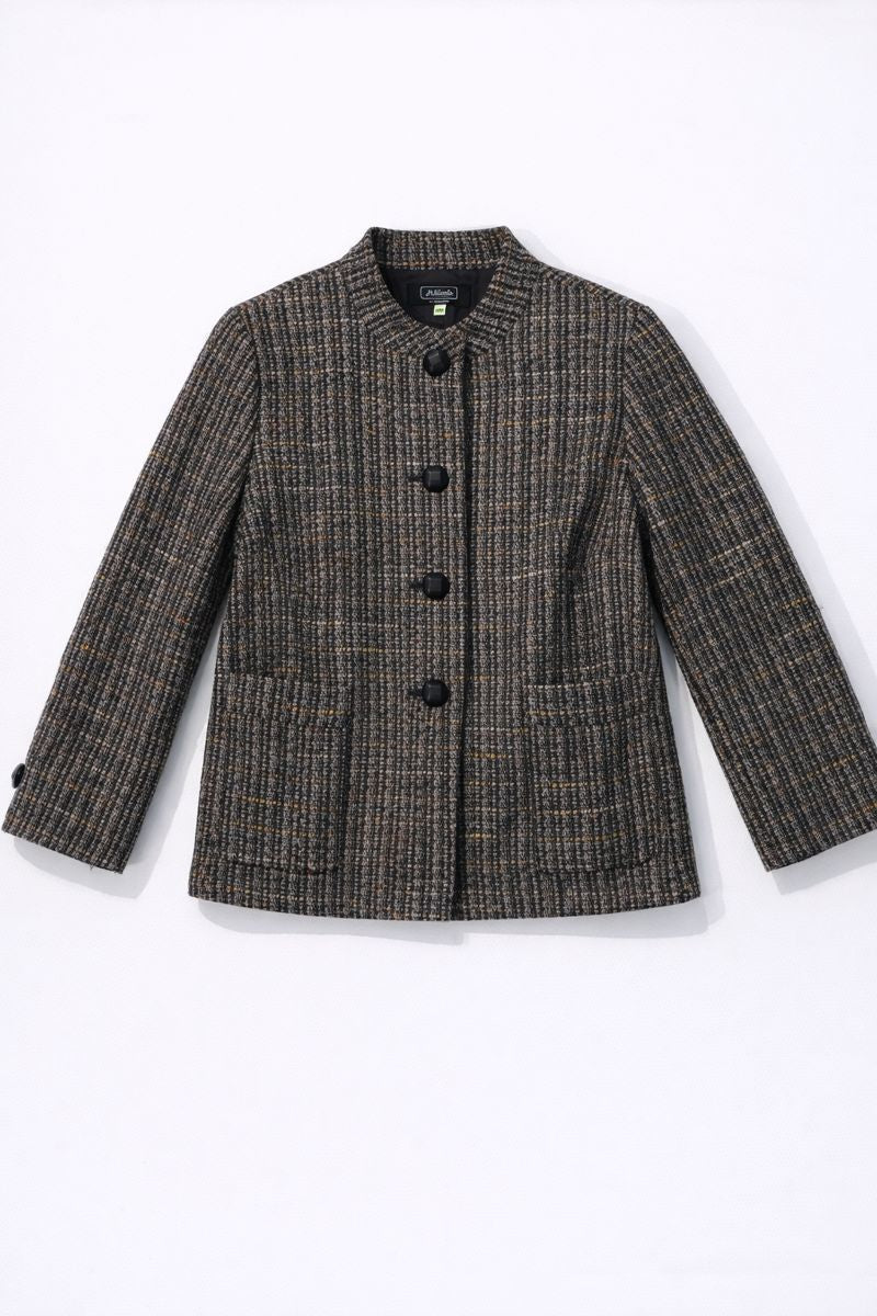 Tailored tweed jacket with mandarin collar, four-button front, and patch pockets