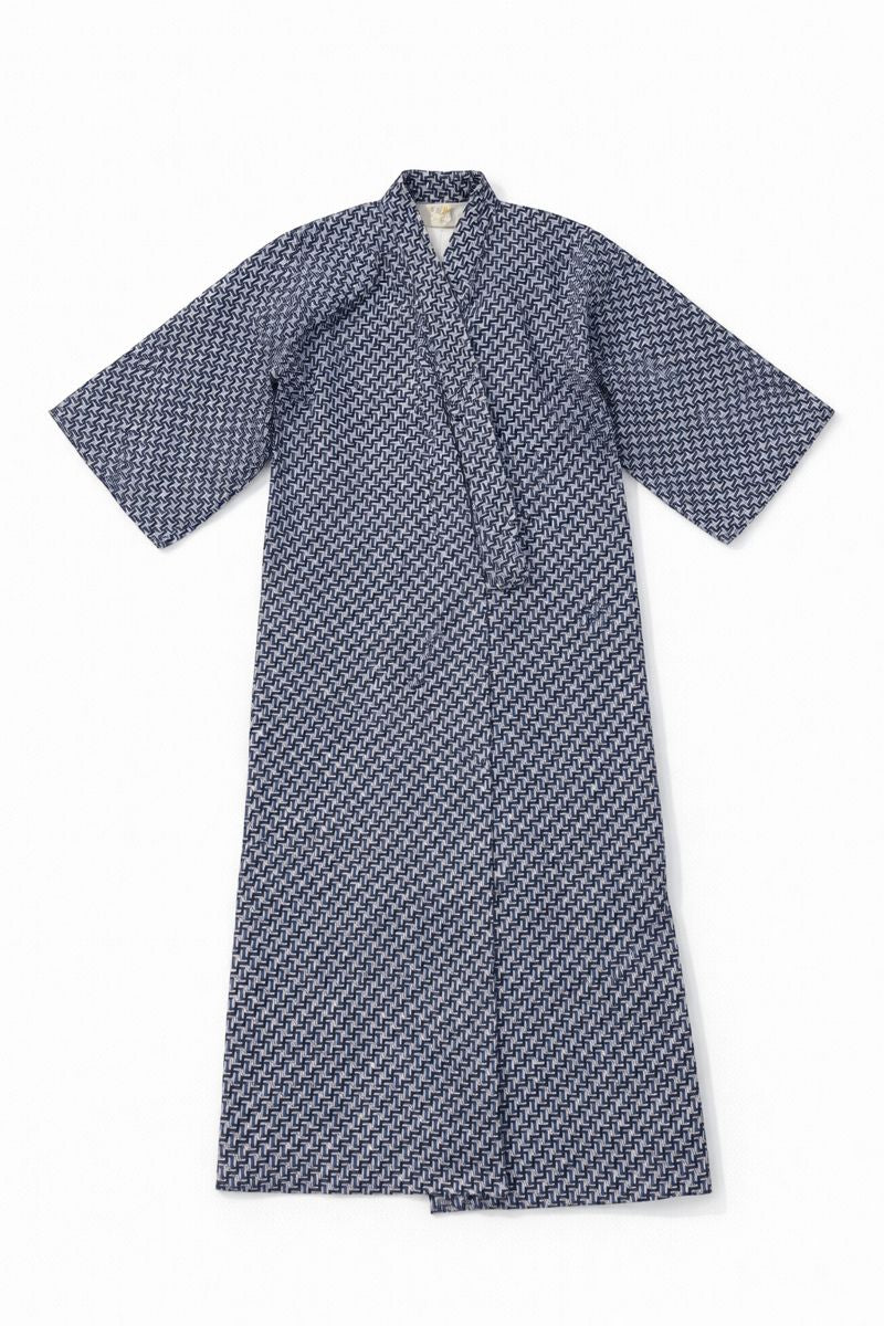 Japanese cotton yukata robe with traditional geometric pattern, long sleeves, and wrap closure