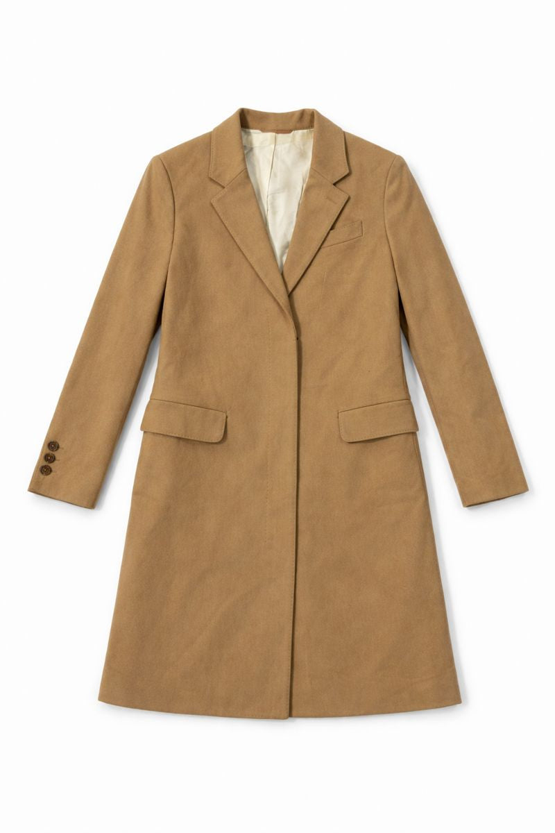 Camel brown cotton velvet corduroy coat with notched lapels, front flap pockets, and buttoned cuffs