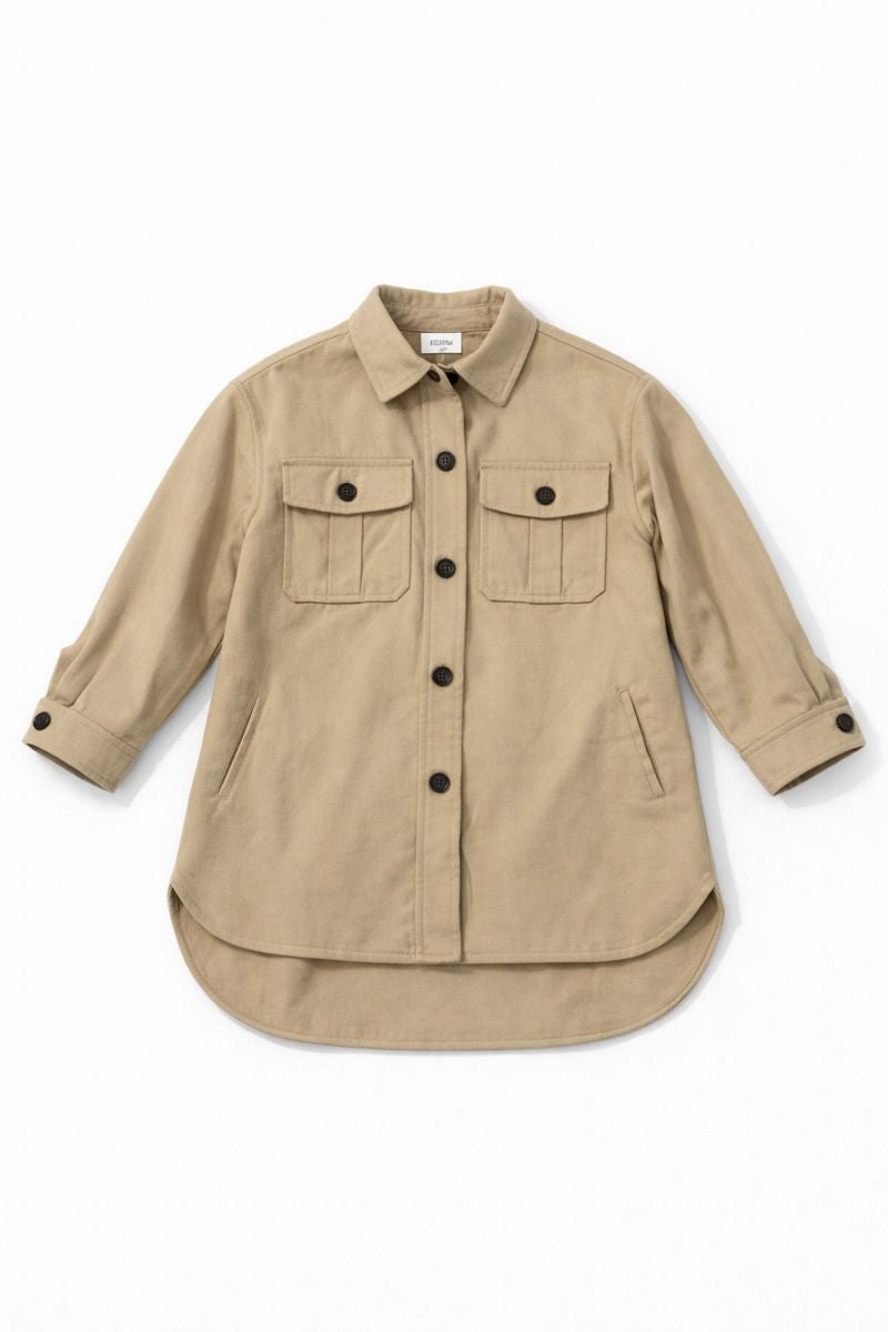 Textured corduroy overshirt jacket with button front, chest flap pockets, and rounded hem