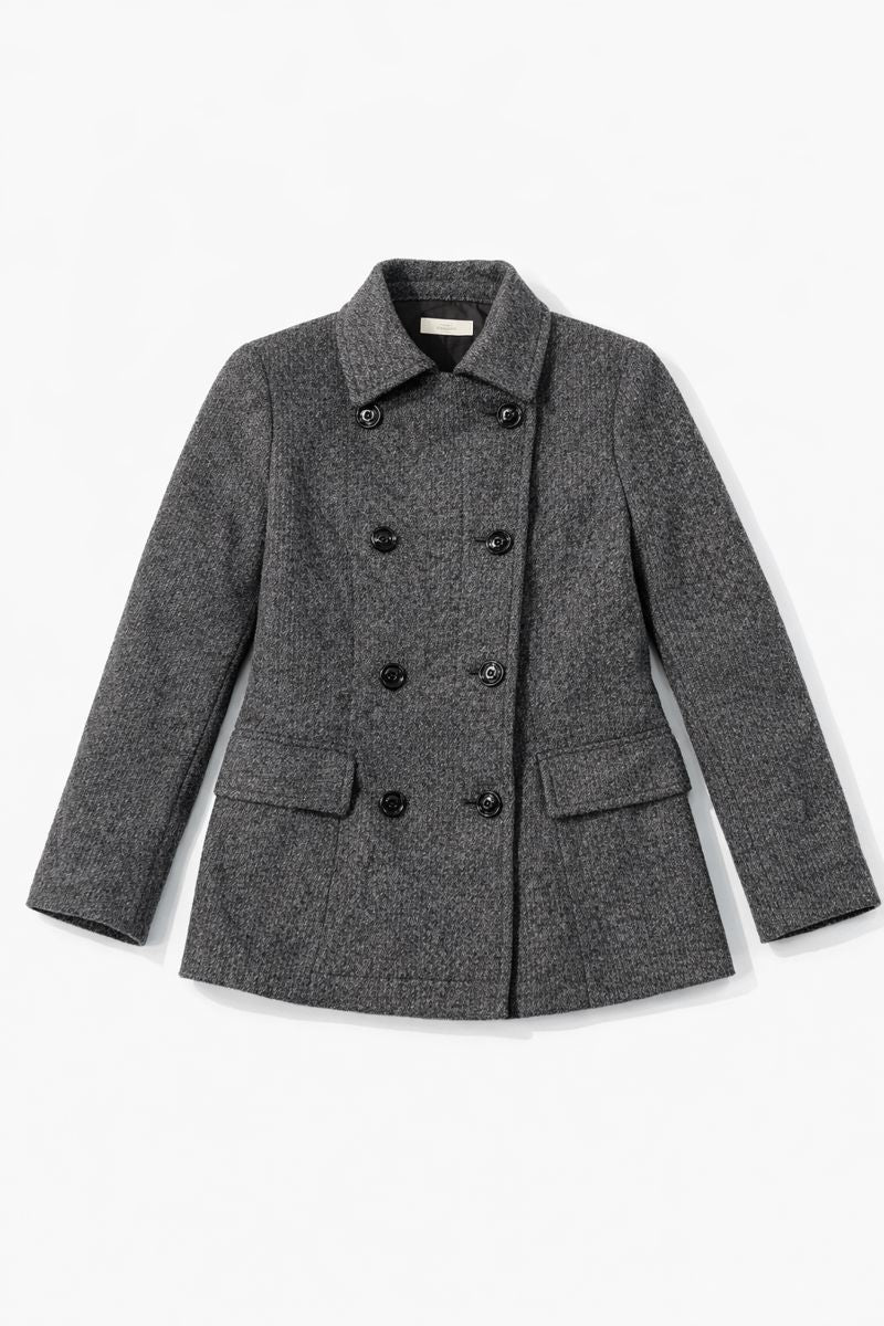 double-breasted short coat with textured fabric, notched lapels, long sleeves, and front flap pockets