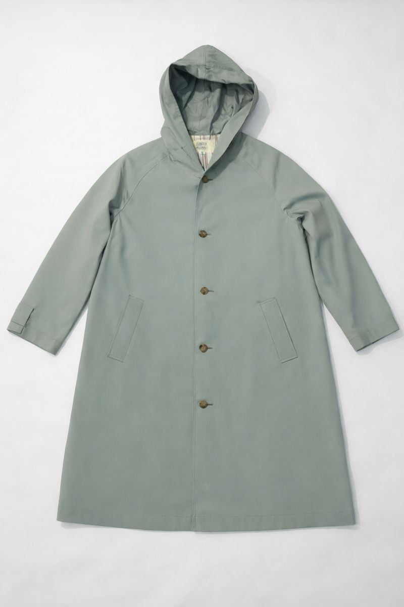A-line waterproof raincoat with drawstring hood and snap-button closure