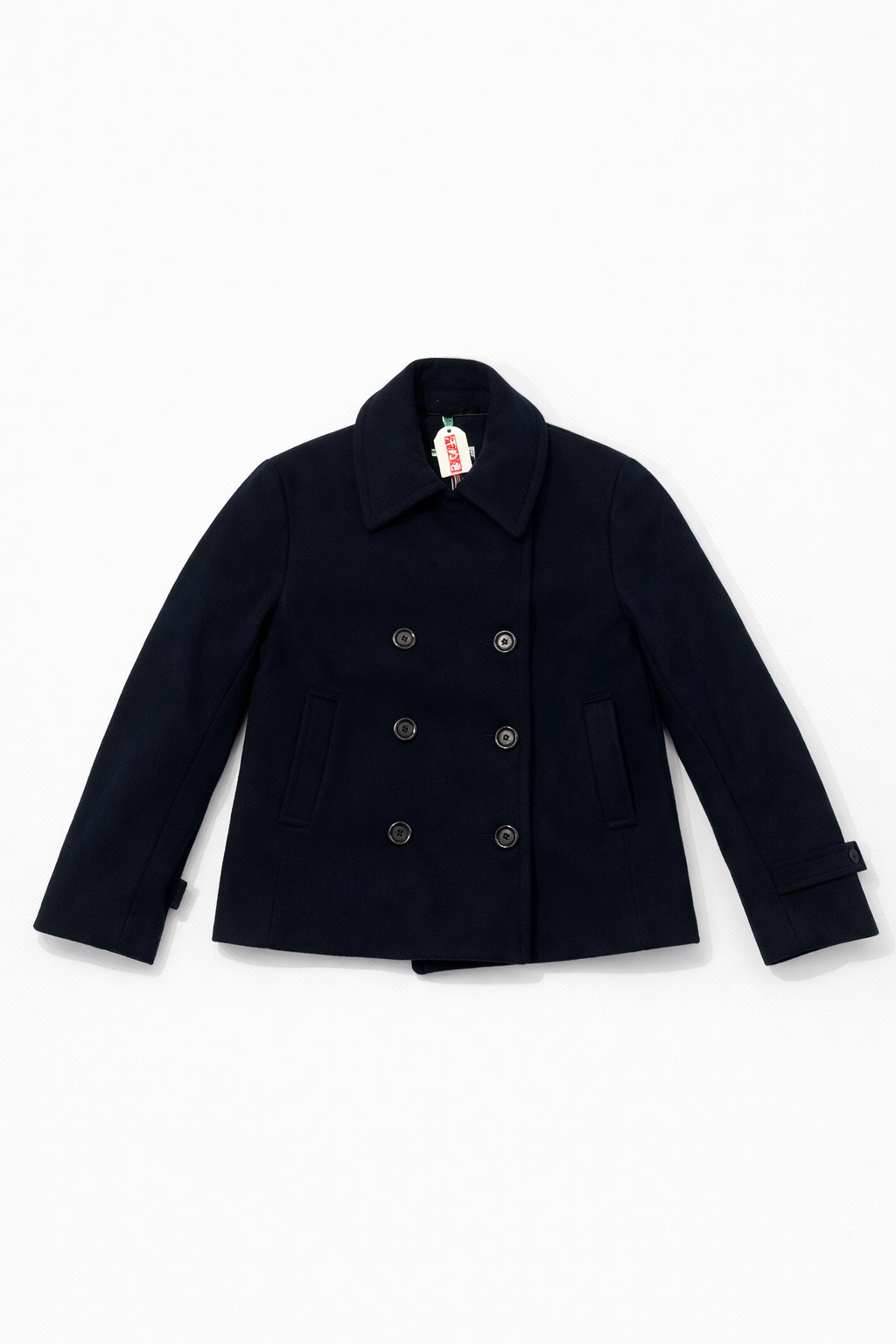 Double-breasted wool peacoat with broad lapels, button-tab cuffs, and front pockets