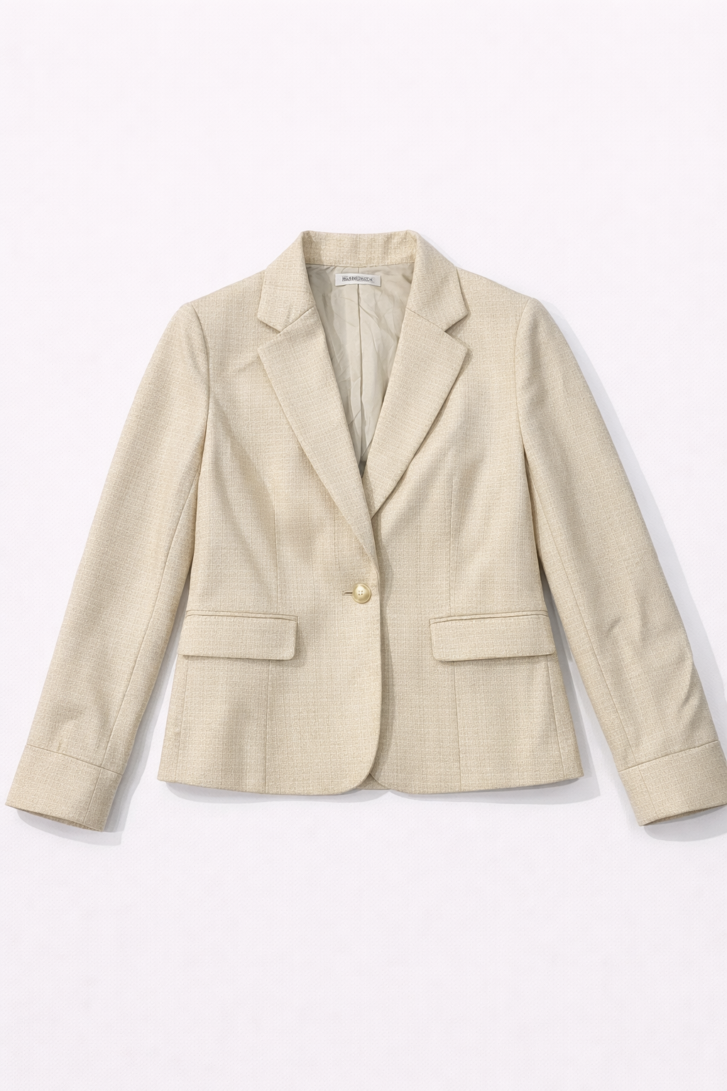 Cream corduroy blazer with single button closure