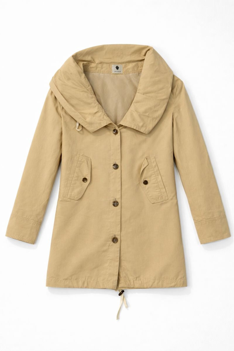 Knee-length coat with stand-up collar, button-front closure, flap pockets, and adjustable hem