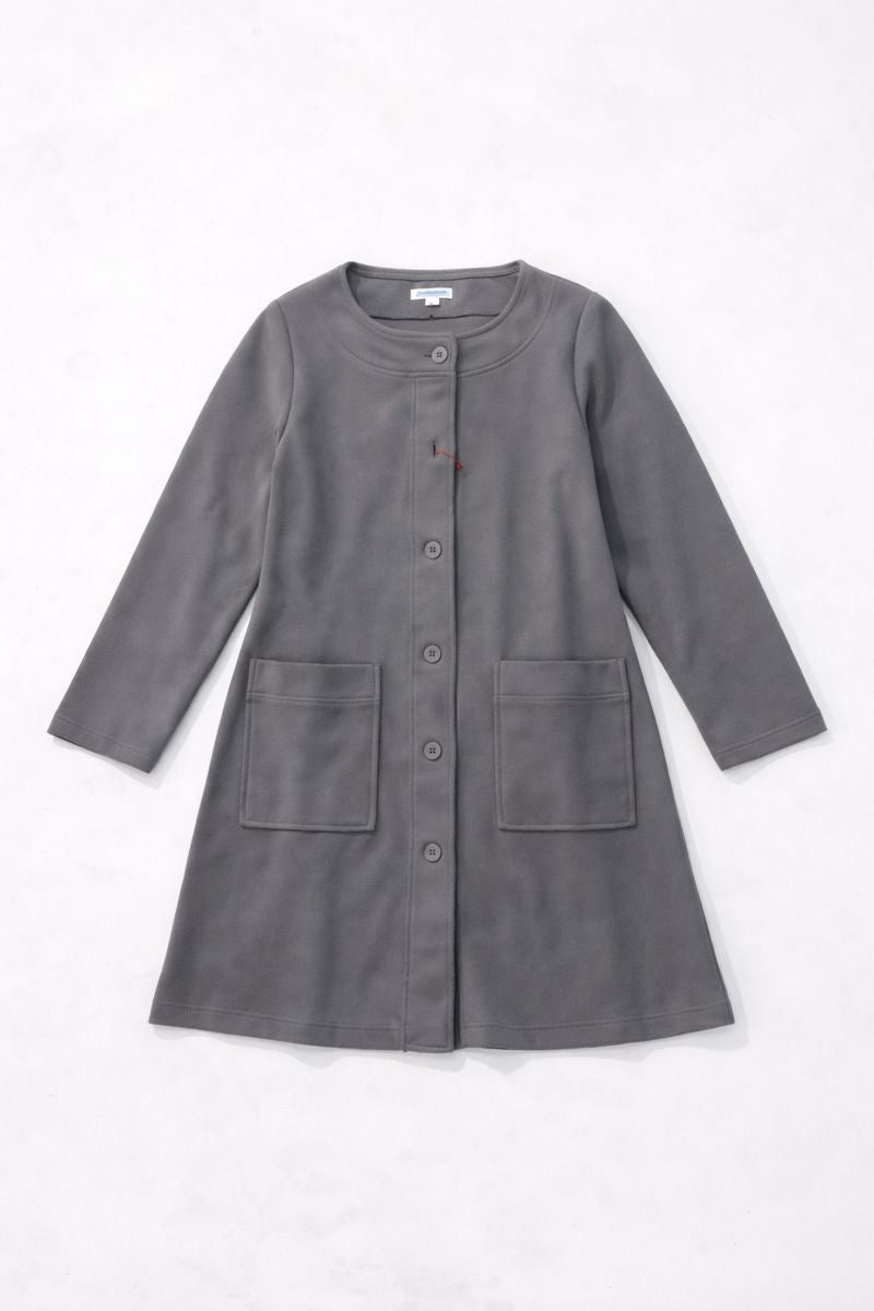 Single-breasted collarless knit coat with button-front closure and patch pockets