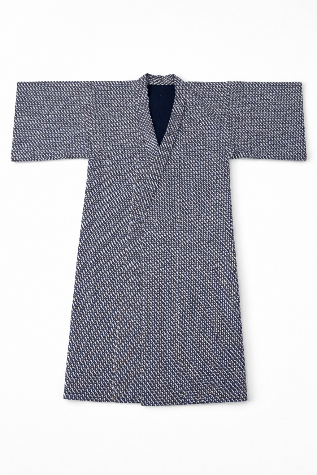 Cream textured wool coat with structured longline silhouette