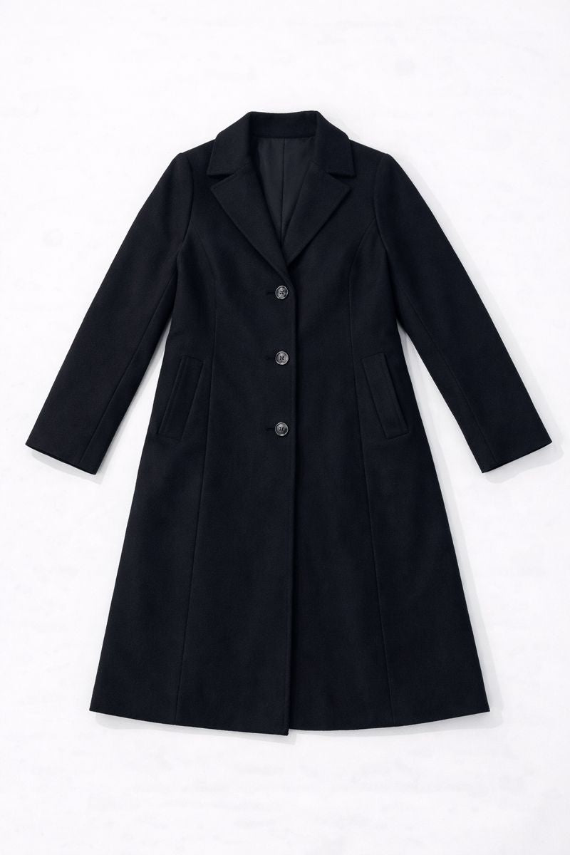 Deep blue tailored coat with lapels and three-button front