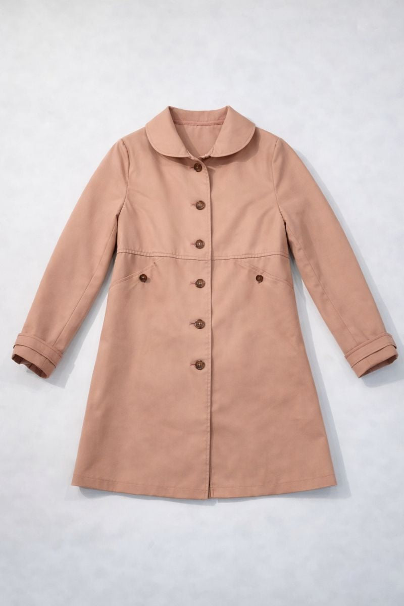 Light brown women? pea coat with Peter Pan collar, single-breasted buttons, cuffed sleeves, and waist pockets